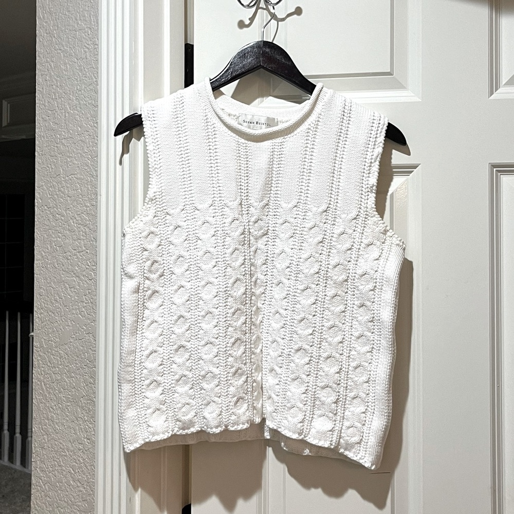 Knit white top.
